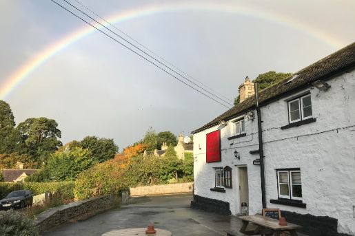 Rainbow over the Three Horseshoes pub